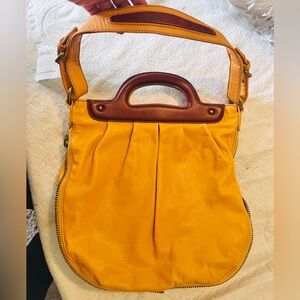 Cynthia Rowley Zip-Around Cutout-Handle Leather Hobo – Mustard/Yellow
